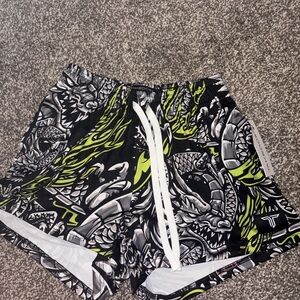 Dynamic Black and Green Graphic Women's Athletic Shorts